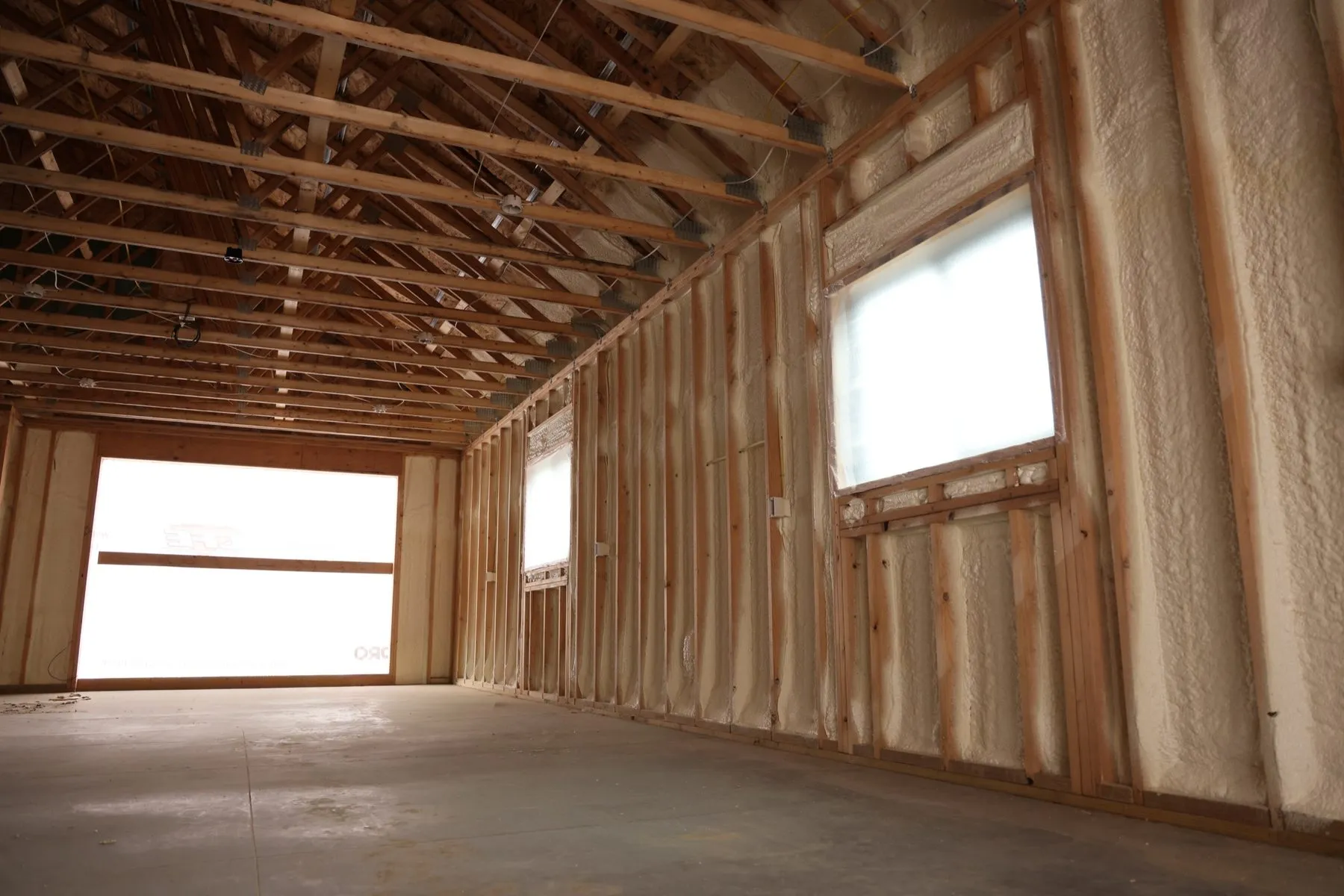 Spray foam application in progress